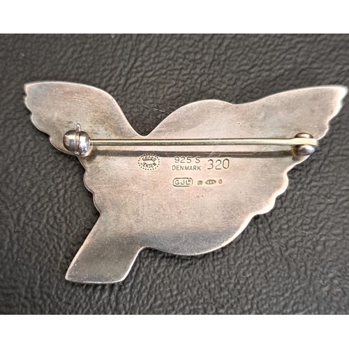 52 - GEORG JENSEN DANISH SILVER BROOCH 
in the form of a silver bird, designed by Arno Malinowski, stampe... 