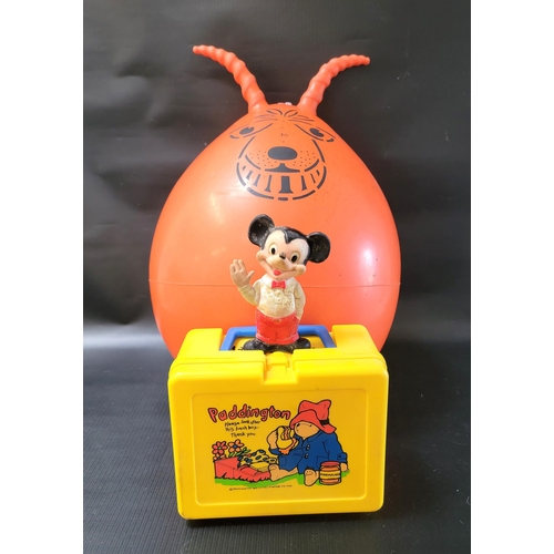 359 - THREE RETRO ITEMS
including space hopper, yellow Paddington bear lunchbox, and Mickey Mouse rubber t... 