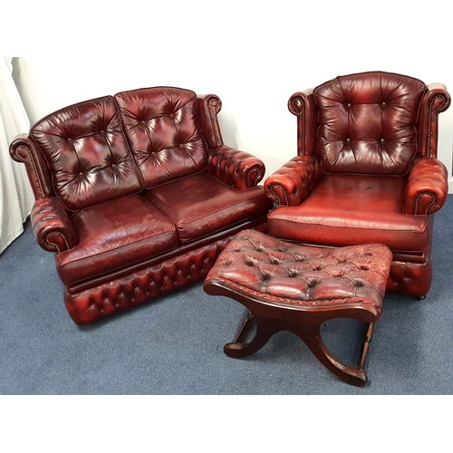 463 - OX BLOOD CHESTERFIELD SOFA
with two seats and loose button back and seat cushions, with scroll arms ... 