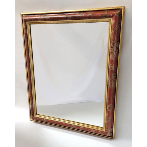 493 - RECTANGULAR WALL MIRROR
with a plain plate and a floral decorated frame, 63.5cm x 79cm