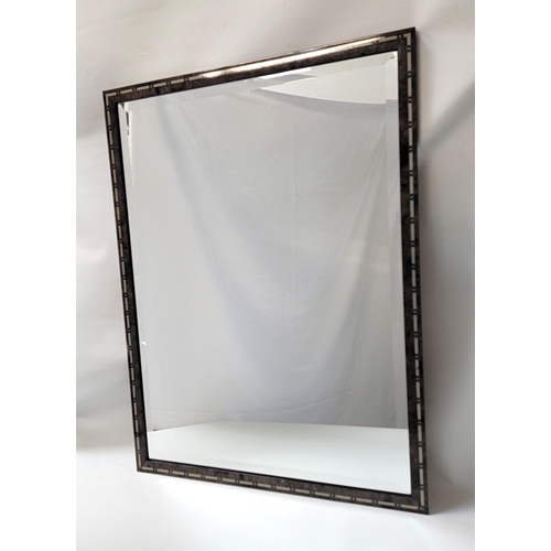 509 - FAUX WOOD RECTANGULAR WALL MIRROR
with a bevelled plate, 65cm x 88cm