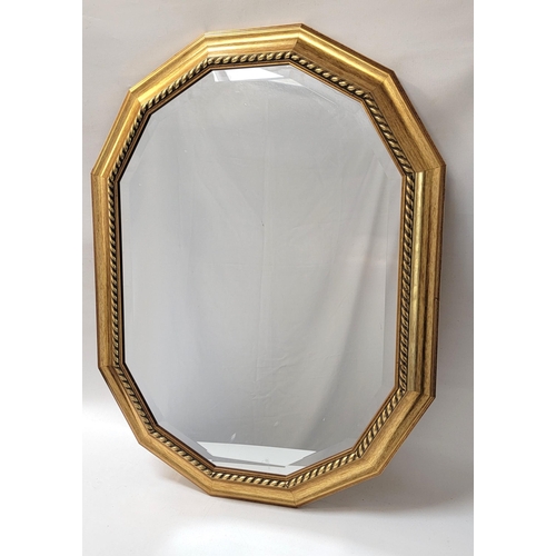 511 - GILT FRAME DODECAGON WALL MIRROR
with a bevelled plate, 64.5cm x 85cm