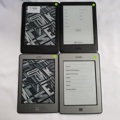 131 - FOUR AMAZON KINDLE E-READERS 
comprising 2x Basic 3, serial numbers G090 VB06 0474 0PLS and G090 VB0... 