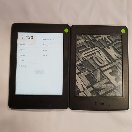 133 - TWO AMAZON KINDLE PAPERWHITE 3 E-READERS 
serial numbers G090 G105 5432 04H3 and G090 G105 7385 06VM... 