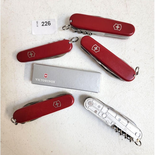 226 - SIX VICTORINOX SWISS ARMY KNIVES
of various sizes and designs, one in box
Note: You must be over the... 