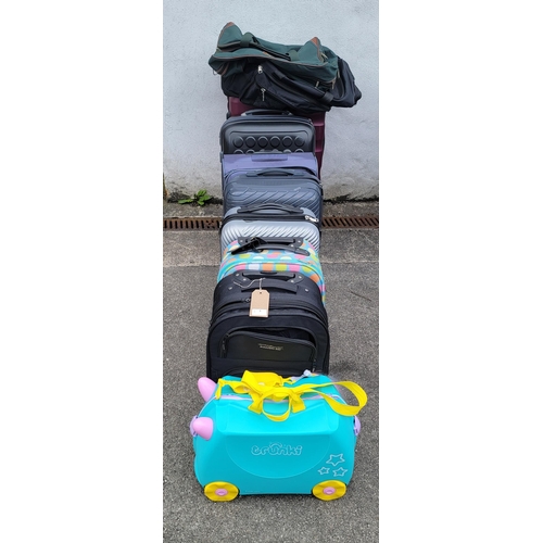 1 - SELECTION OF EIGHT  SUITCASES AND TWO HOLDALLS
Including Tripp and Trunki (10)
Note: All suitcases a... 