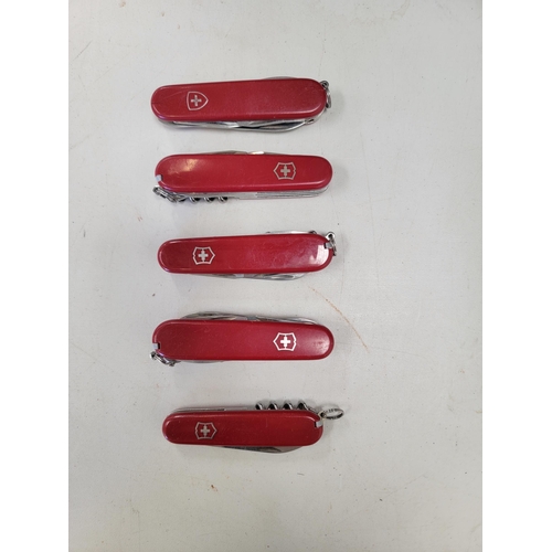 119 - FIVE VICTORINOX SWISS ARMY KNIVES
of various sizes and designs
Note: You must be over the age of 18 ... 