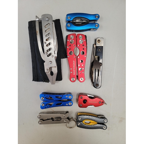 122 - EIGHT MULTI-TOOLS
of various sizes and designs, including Mastergrip, 
Note: You must be over the ag... 