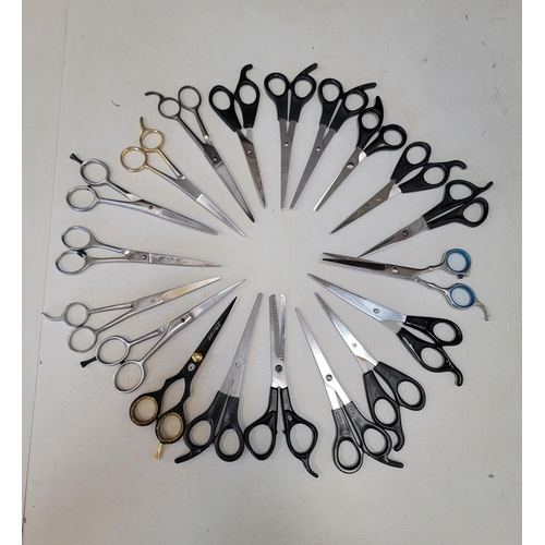 128 - NINETEEN PAIRS OF HAIRDRESSER'S SCISSORS
including Candure, Wahl, etc.
Note: You must be over the ag... 