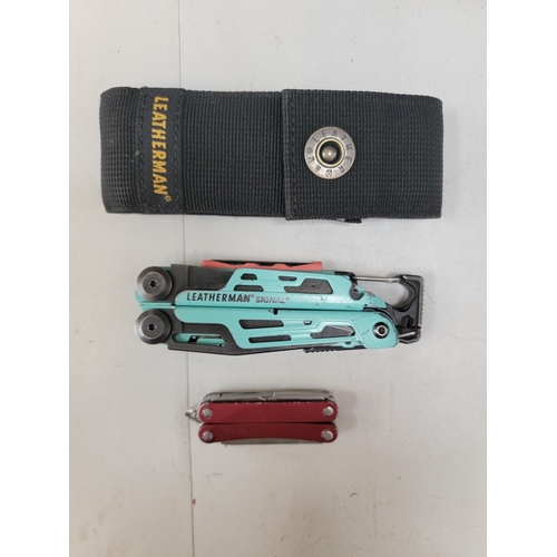 148 - TWO LEATHERMAN MULTI-TOOLS
comprising a Squirt and a Signal in case
Note: You must be over the age o... 