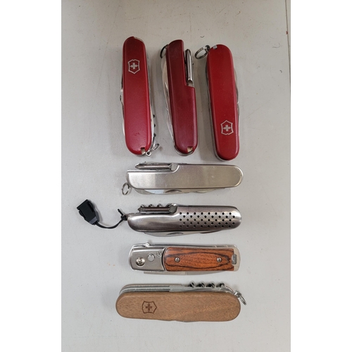 149 - SEVEN VARIOUS SWISS ARMY KNIVES
including three Victorinox, of various sizes
Note: You must be over ... 