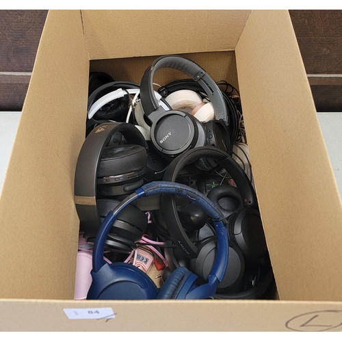 84 - ONE BOX OF HEADPHONES
including on ear and in ear