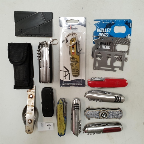 125 - SEVEN NINE SWISS ARMY KNIVES
of various sizes and designs, together with four wallet tools
Note: You... 