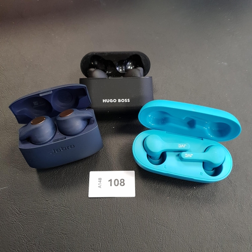 108 - THREE PAIRS OF EARBUDS IN CHARGING CASES
comprising Jabra, JVC and Hugo Boss