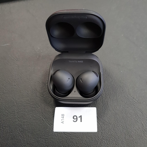 91 - PAIR OF SAMSUNG EARBUDS
in charging case, model SM-R510