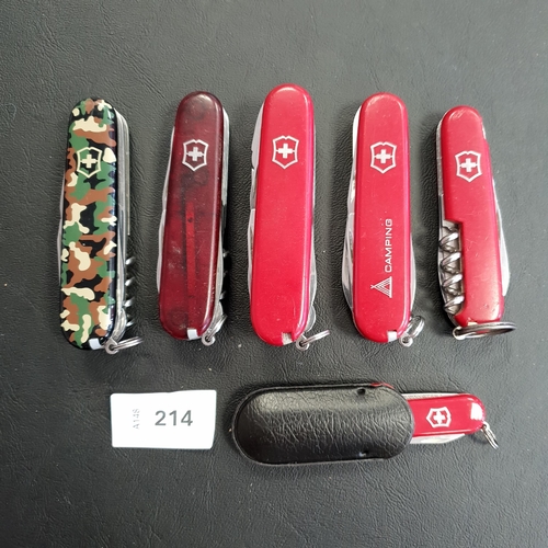 214 - SIX VICTORINOX SWISS ARMY KNIVES
of various sizes and designs
Note: You must be over the age of 18 t... 