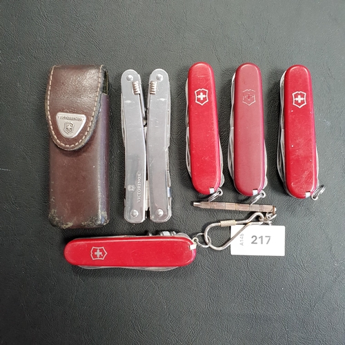 217 - FOUR VICTORINOX SWISS ARMY KNIVES AND A MULTI-TOOL
of various sizes and designs
Note: You must be ov... 