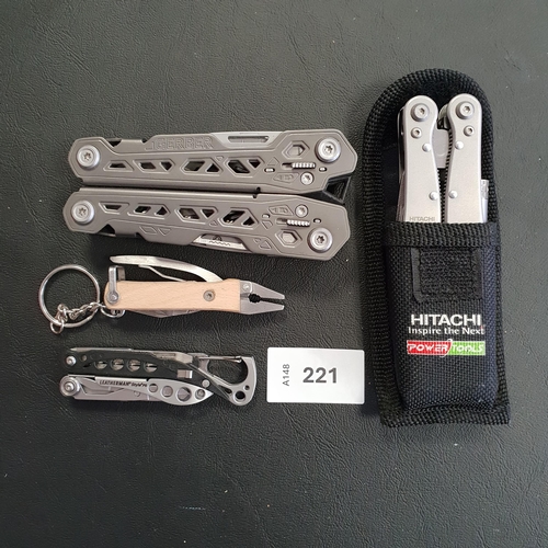 221 - FOUR MULTI-TOOLS
of various sizes and designs, including a Leatherman Style PS and a Gerber
Note: Yo... 