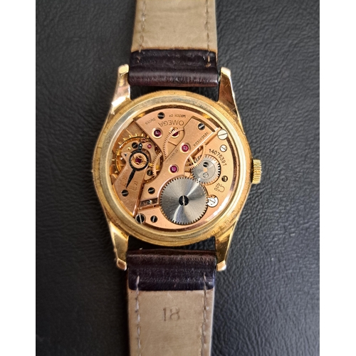 100 - GENTLEMAN'S NINE CARAT GOLD CASED OMEGA WRISTWATCH
the circular dial with Arabic numerals at 3, 6, 9... 