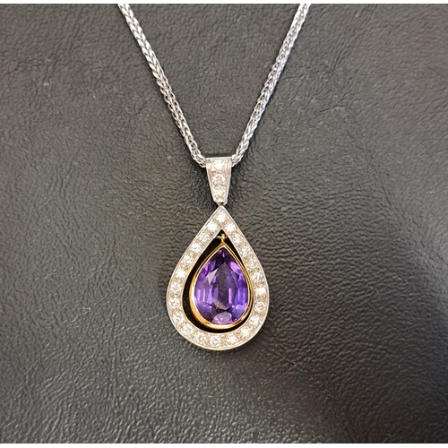 73 - IMPRESSIVE AMETHYST AND DIAMOND PENDANT
the central pear cut amethyst drop measuring approximately 1... 