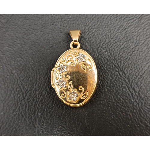 96 - NINE CARAT GOLD LOCKET PENDANT
in yellow gold with white gold flower detail, 2.7cm high (including s... 