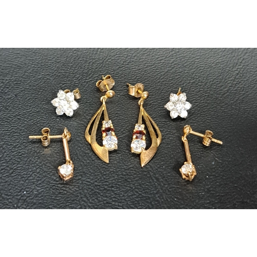 97 - THREE PAIRS OF CZ SET EARRINGS
all in gold, the single stone drops earrings in unmarked gold and the... 