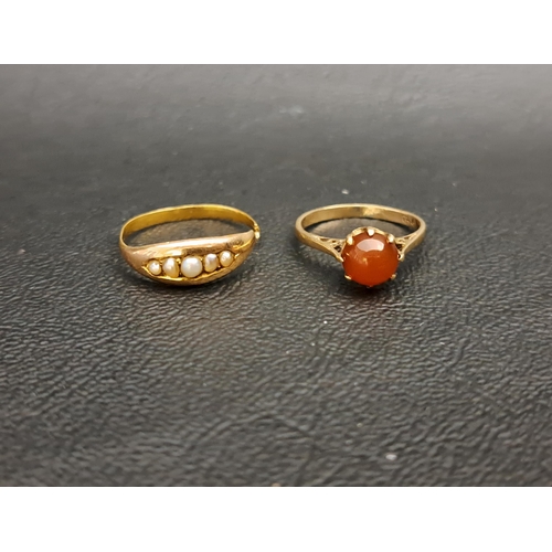 122 - CARNELIAN SINGE STONE RING
the round cabochon stone on nine carat gold shank, ring size G-H; togethe... 