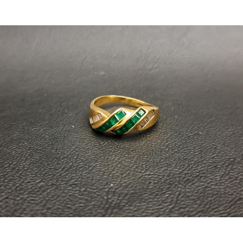 124 - EMERALD AND DIAMOND DRESS RING
the two central diagonal rows of square cut emeralds flanked by chann... 