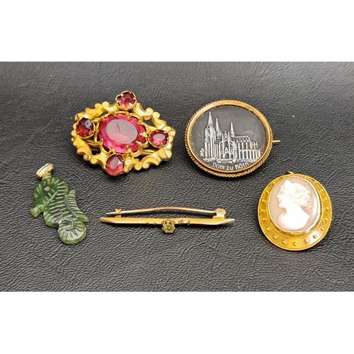 146 - FOUR VINTAGE BROOCHES
including a cameo example; and a jade coloured hardstone seahorse pendant (5)