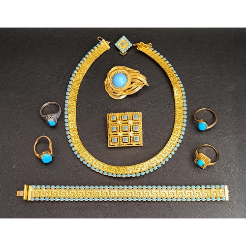 87 - SELECTION OF TURQUOISE SET JEWELLERY
comprising four rings on silver gilt shanks; two brooches, a ne... 