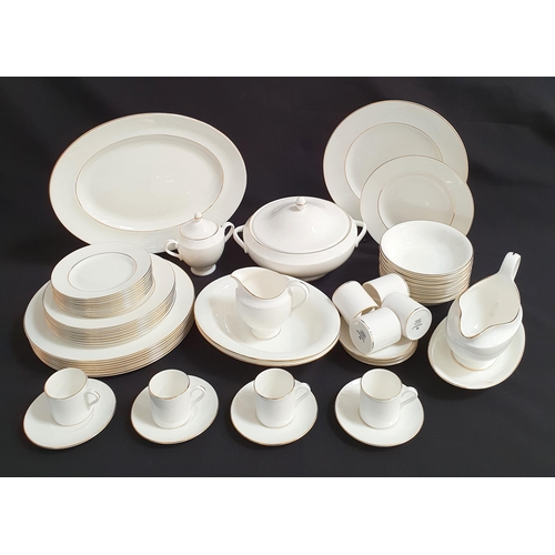 WEDGEWOOD 'SIGNET GOLD' DINNER SERVICE 
for eight place settings consisting of ashet, two large serving bowls, tureen, sauce boat and saucer, dinner plates, side plates, bowls, sugar bowl and lid and cream jug (55 pieces)