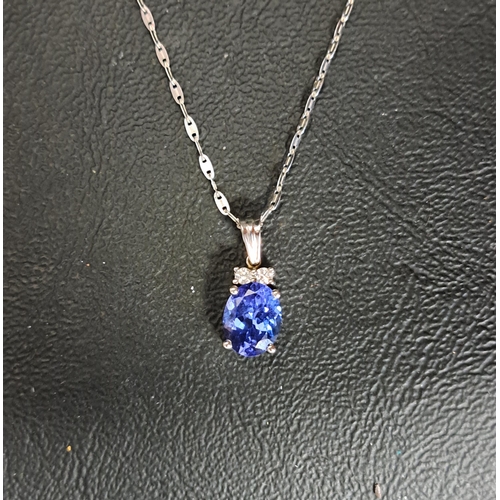 69 - TANZANITE AND DIAMOND PENDANT
the oval cut tanzanite approximately 1.5cts below two small diamonds t... 