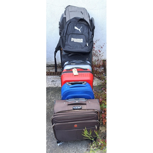 1 - SELECTION OF SEVEN SUITCASES, ONE RUCKSACK AND ONE HOLDALL
including Diplomat, TGS, Puma, Swish Navy... 