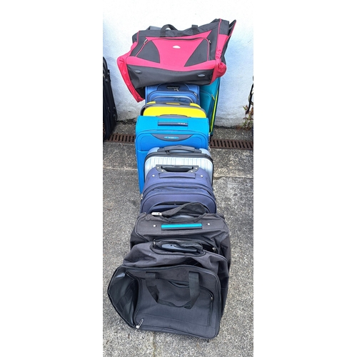 6 - SELECTION OF EIGHT SUITCASES AND ONE RUCKSACK
including Leader, Tripp, Samsonite and Bordlite
Note: ... 