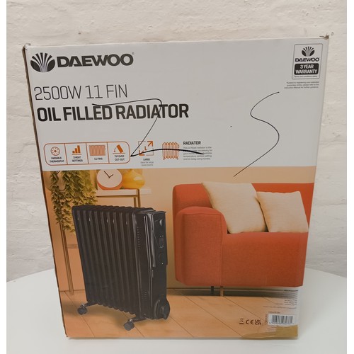 66 - BOXED DAEWOO 2500W 11 FIN OIL FILLED RADIATOR