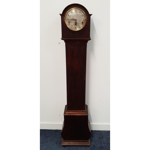 501 - EDWARDIAN GRANDMOTHER CLOCK
with domed top and plain dial, the Mahogany case on ball feet, 143cm hig... 