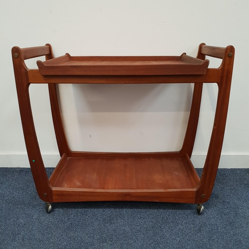 424 - MID CENTURY G PLAN TEAK BUTLERS TEA TROLLEY
with lower shelf and raised on chrome castors, 83 x 74 x... 