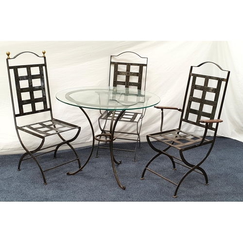 442 - WROUGHT IRON CHAIRS AND GLASS TOPPED TABLE
consisting of a pair with teak arms, 106 x 60 x 45cm; and... 