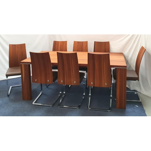 491 - STYLISH VENJAKOB DINING TABLE AND EIGHT CHAIRS
the table in stained wood with brushed metal detail t... 