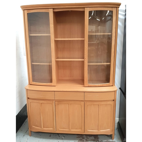 497 - NATHAN LIGHT OAK ILLUMINATED SIDE CABINET
the upper section with two glazed doors flanking open shel... 