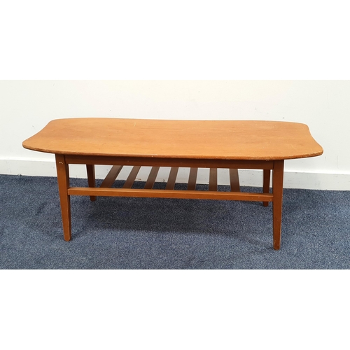 444 - MID CENTURY SURFBOARD STYLE TEAK COFFEE TABLE
with teak magazine shelf, 105 x 39 x 40cm