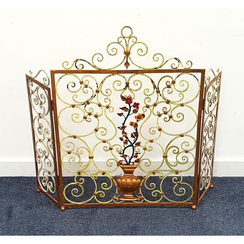 445 - TRYPTICH FLORAL IRON WORK FIRE SCREEN
with raised flowers in vase on scroll work, over painted in vi... 