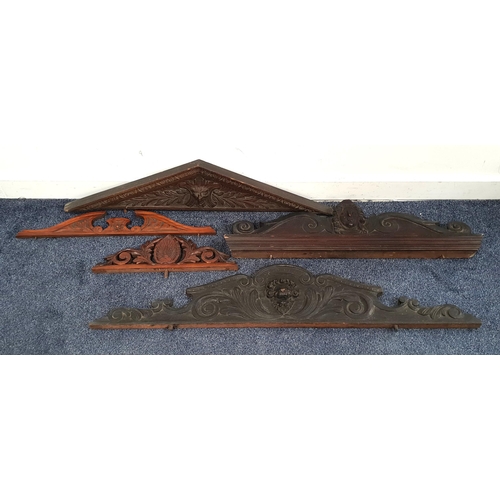 446 - FIVE VICTORIAN AND EDWARDIAN PEDIMENTS
various woods, one depicting a green man, one a ladies face a... 