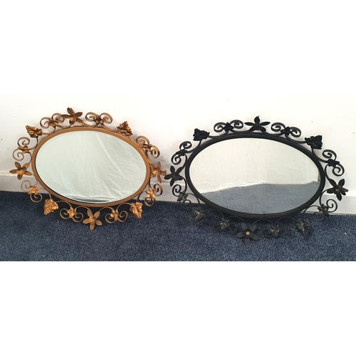 448 - TWO BEVEL EDGED OVAL MIRRORS WITH METAL WORK FOLIATE FRAME
one gilt, one black, 58 x 45cm (2)