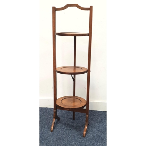 477 - EDWARDIAN MAHOGANY PLATE/PLANT STAND
with three tiers, 90cm high