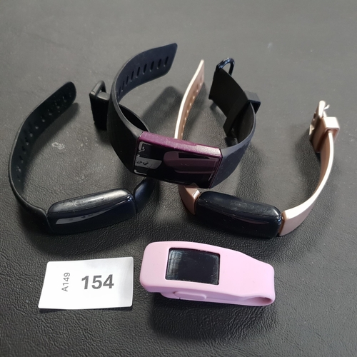 154 - FOUR FITBIT FITNESS TRACKERS
comprising 2x Inspire 2, Inspire and Charge 4