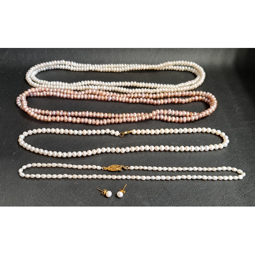 45 - FOUR VARIOUS PEARL NECKLACES
including one with silver clasp; and a pair of pearl stud earrings