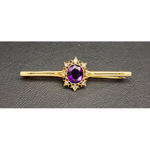 112 - AMETHYST AND DIAMOND CLUSTER SET BAR BROOCH
the central oval cut amethyst approximately 2.5cts in ei... 