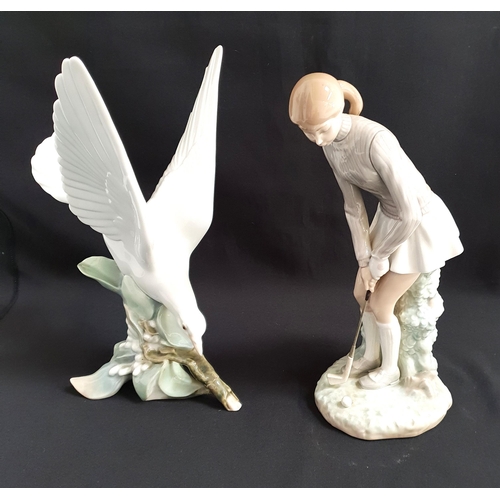 187 - TWO LLADRO FIGURES
'Lady golf player' no 851 and 'Turtle dove' (2)