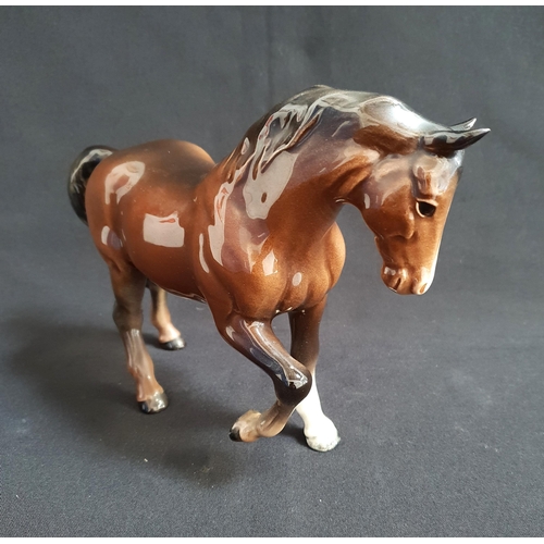 224 - BESWICK HORSE
of a bay colour, stamped Beswick to underbelly, 16cm high